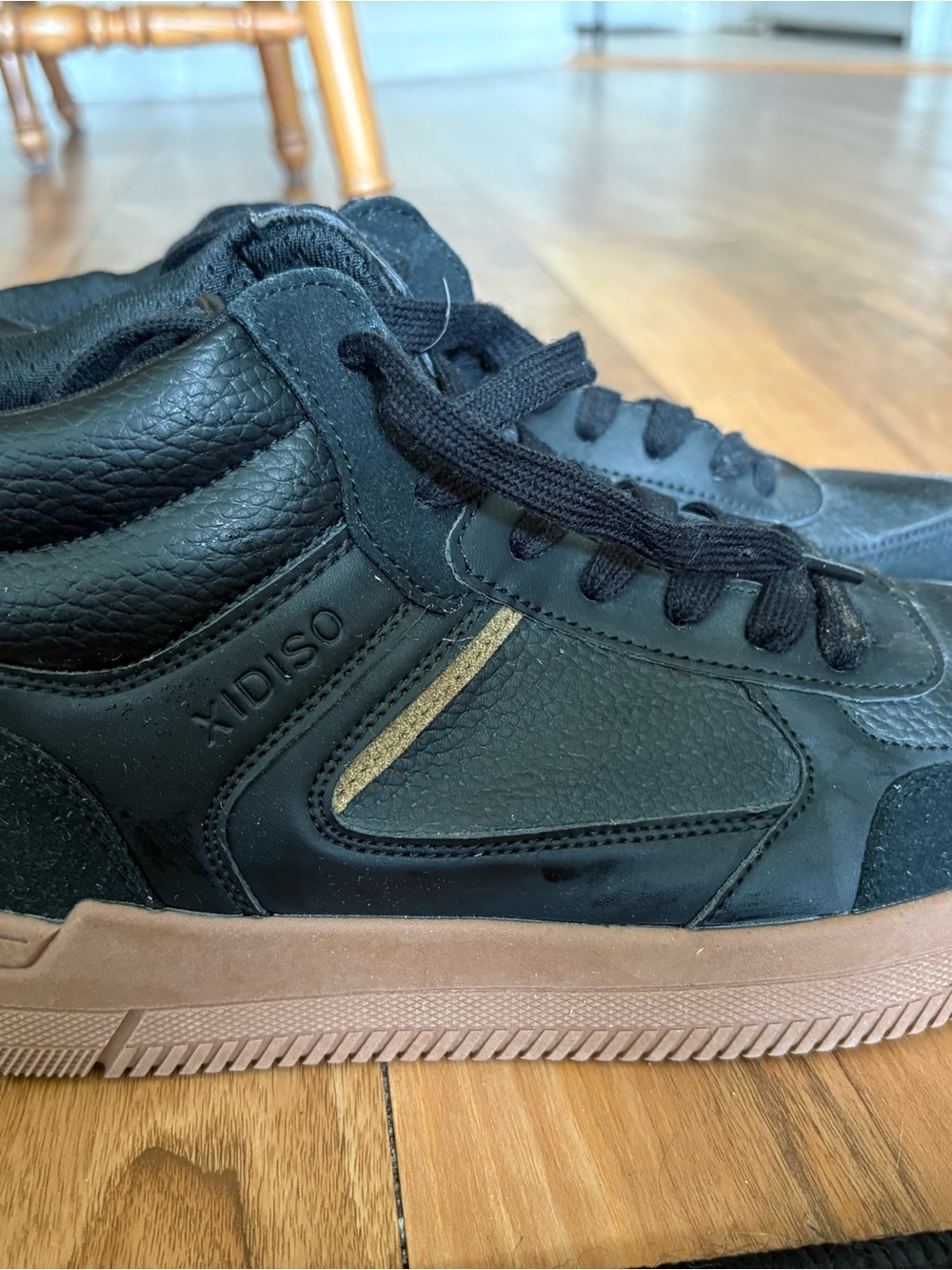 Black High-Top Sneakers with Brown Sole